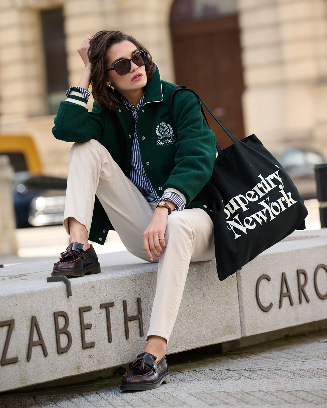 Expertly designed with dropped sleeve and crafted with sumptuous wool fabric, the bomber is the (1)
